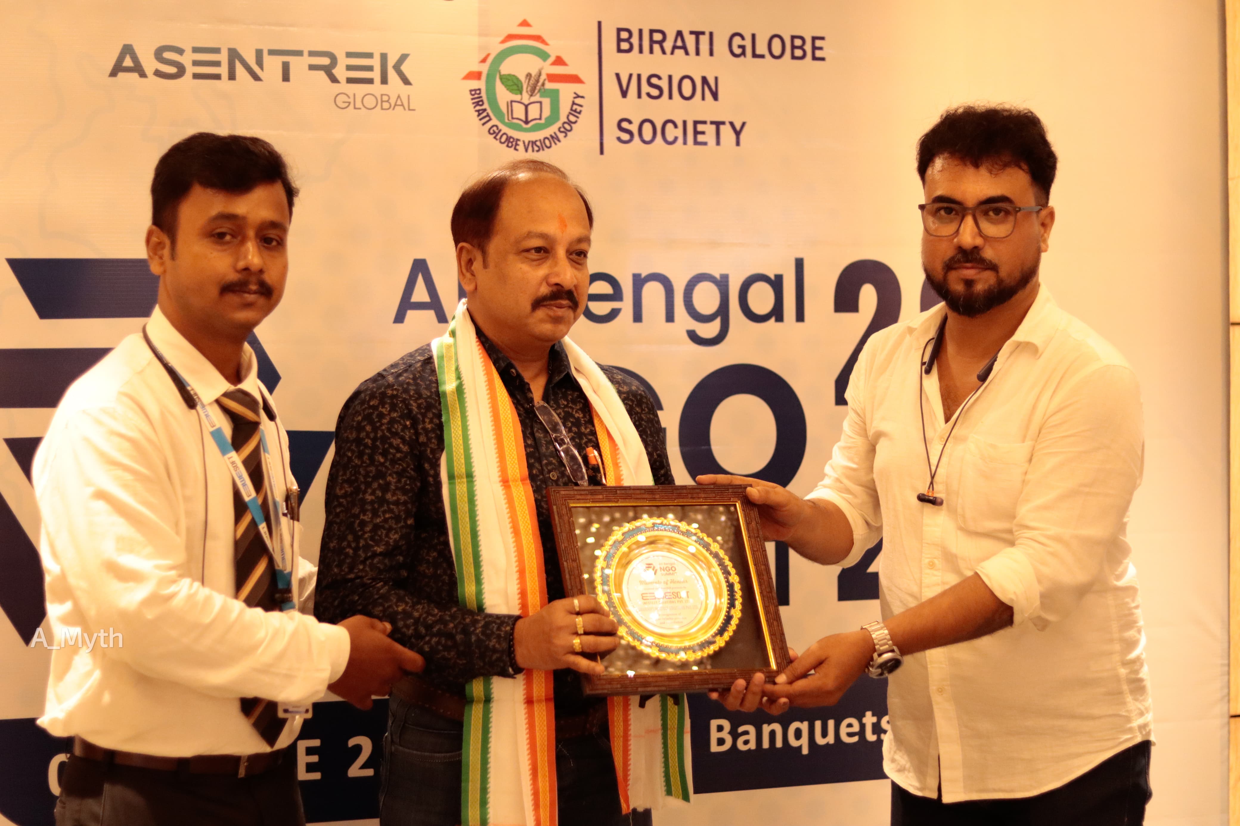 Mr. Chiranjib Ghosh receiving an award recognition