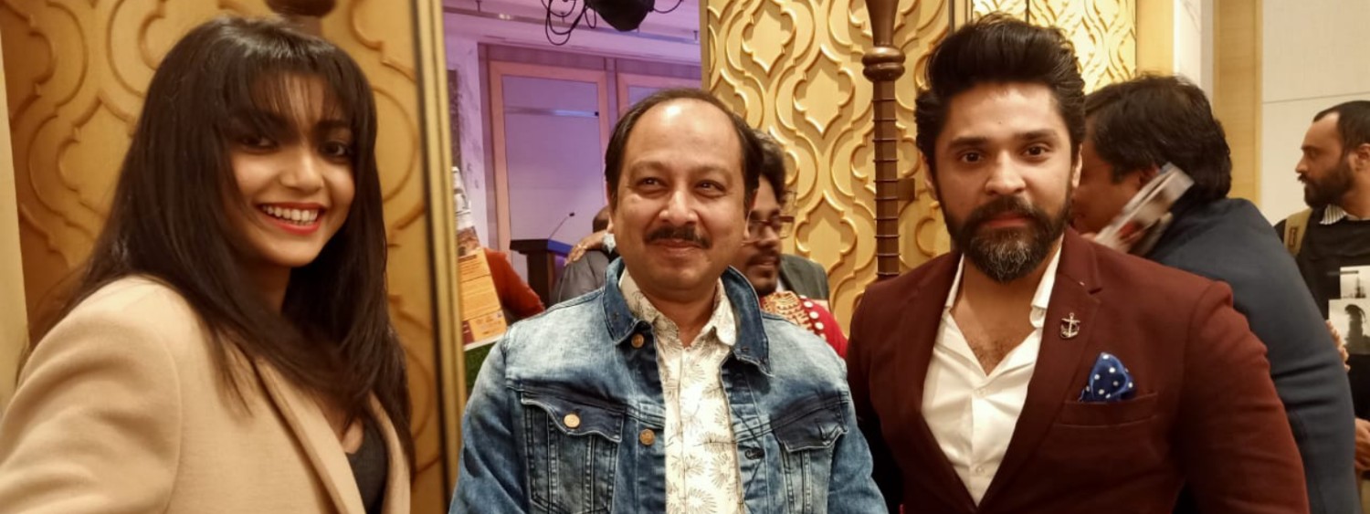 Chiranjib Ghosh participating in an awards and community event